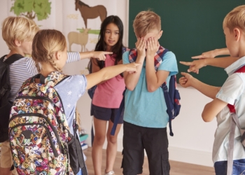 Kids laughing at their classmate