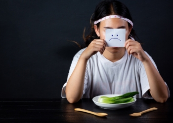 Depressed woman hungry from dieting